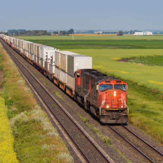 Train going through plains