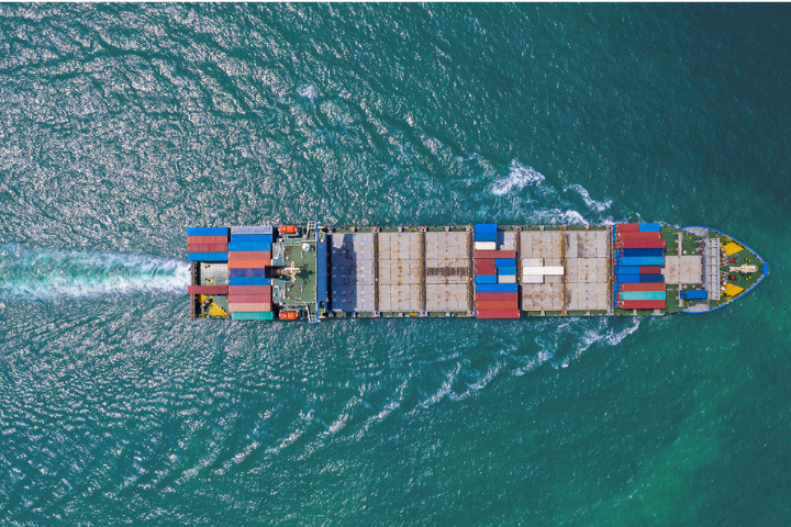 Birdseye-view of large freight ship in ocean